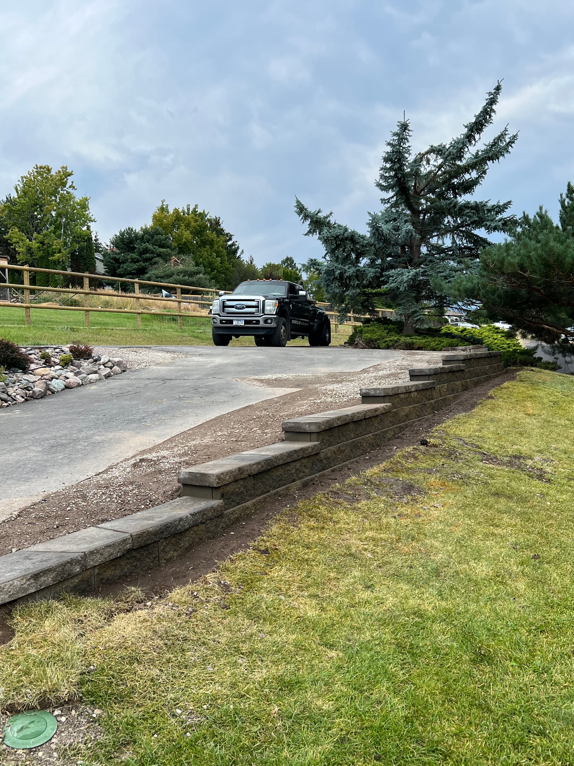 Gallery photos for Driveway Expansion with Retaining Wall Built to Hold Grade: Image #1