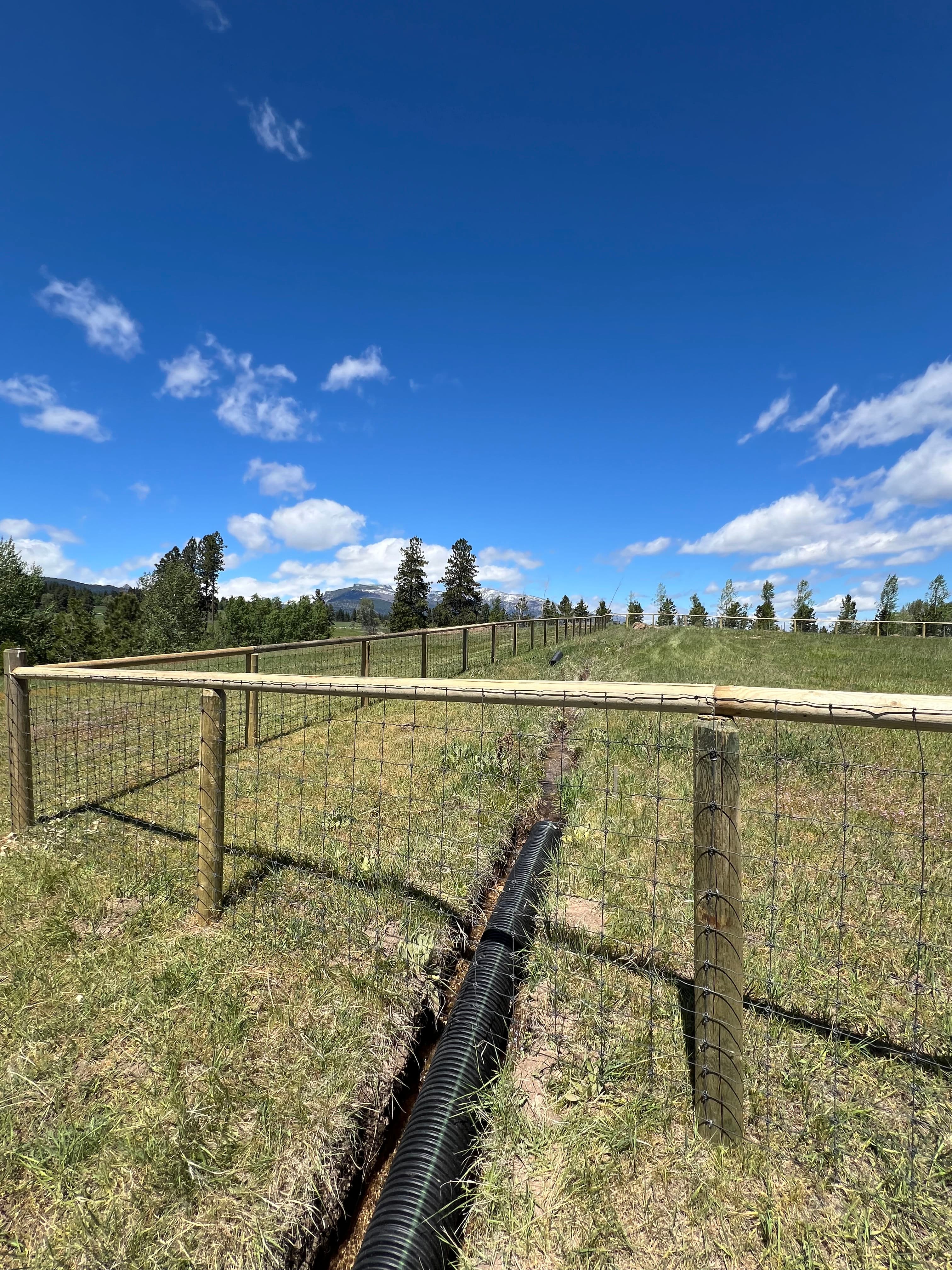 Project Wood Post and Rail Fence with Field Fence Done Right image