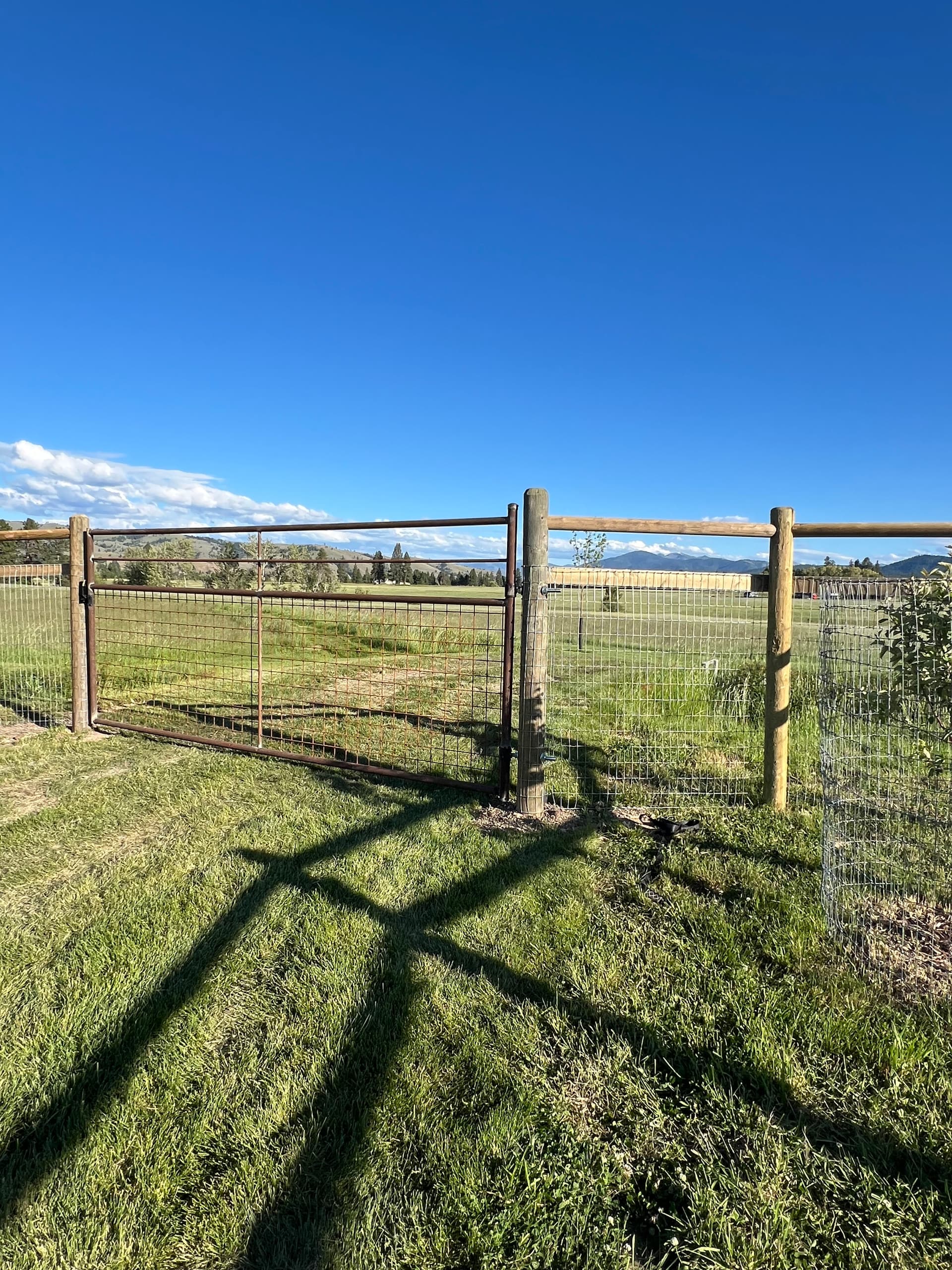 Gallery photos for Wood Fence and Custom Metal Gates Built for Security and a Clean Look: Image #1